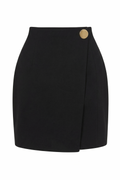 Black skirt with a gold button on a white background